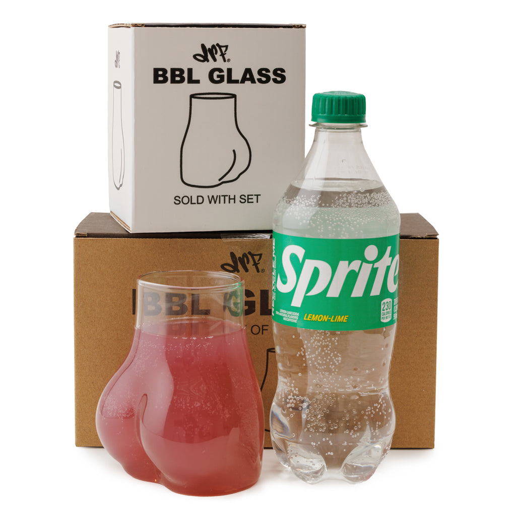 Bottle of Sprite with a glass and packaging labeled 'BBL GLASS' on a white background