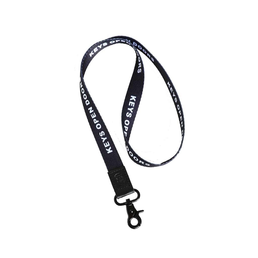 Black lanyard with 'Keys Open Door' text on a white background
