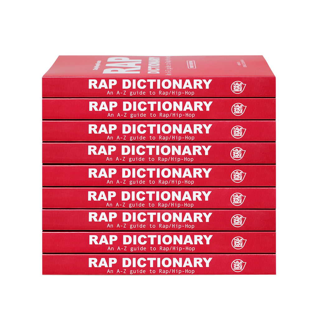 Stack of red books titled 'RAP DICTIONARY' on a white background
