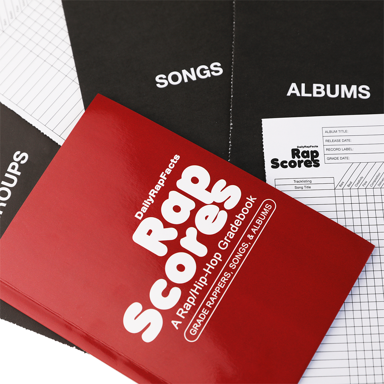 Red 'Rap Scores' gradebook on a grid paper background with music-related text.