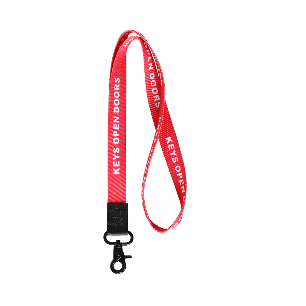 Red lanyard with 'Keys Open Doors' text on a white background